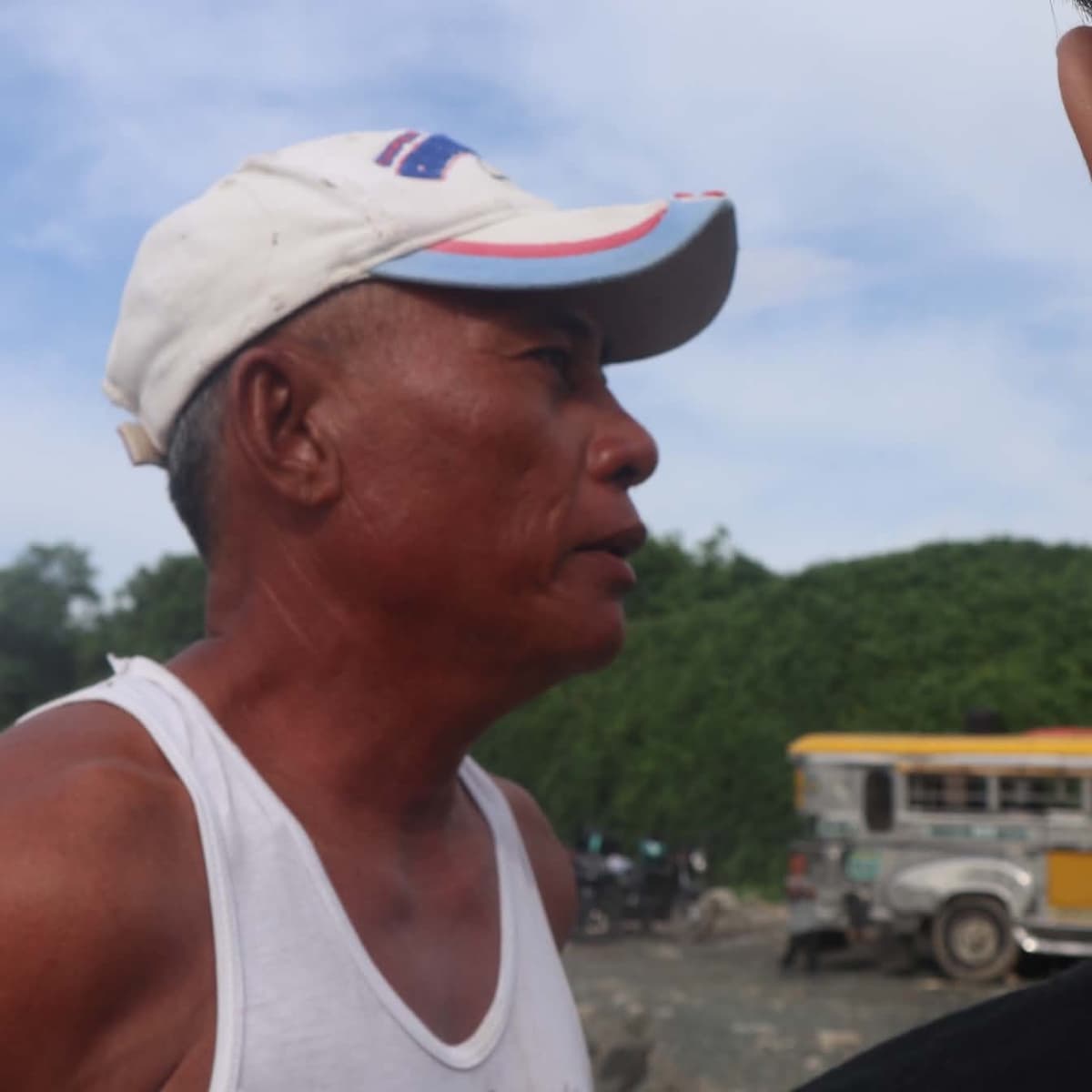 Denise, 49, a lifelong mussel farmer from Navotas, speaks during an interview near the city’s shoreline about how the disappearance of traditional tahungan has reshaped his family’s livelihood. (Photo by: Zaijan Rio Tengson)